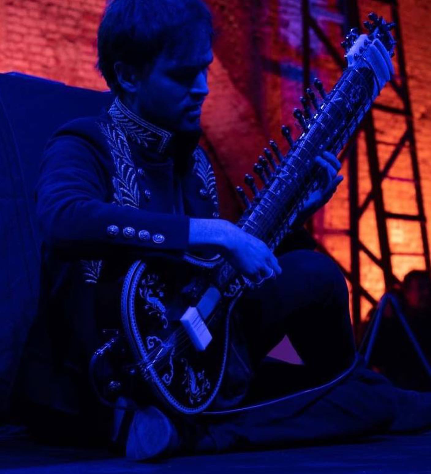 Sitar performance blue light